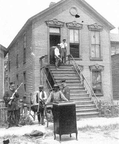 African American family evacuating during the 1919 Chicago Race Riot